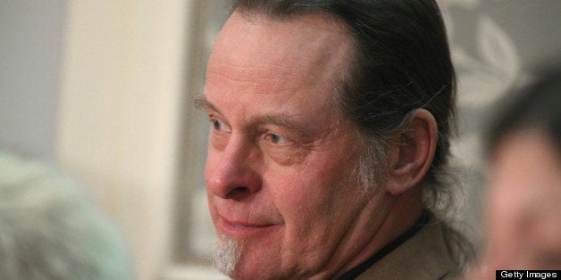 WASHINGTON, DC - FEBRUARY 12: Musician and gun rights advocate Ted Nugent listens as U.S. President Barack Obama delivers hi