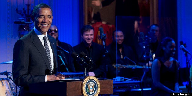 US President Barack Obama speaks during a concert in honor of Memphis Soul music in the East Room of the White House in Washington, DC, on April 9, 2013, as part of the 'In Performance at the White House' series. The concert, featuring performances by Justin Timberlake, Booker T. Jones, Ben Harper, Queen Latifiah, among others, is the latest in the series that honors American musicians from all spectrums of musical genres, and airs next week on the PBS television channel. AFP PHOTO / Saul LOEB (Photo credit should read SAUL LOEB/AFP/Getty Images)