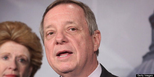 WASHINGTON, DC - MARCH 21: Senate Majority Whip Richard Durbin (D-IL) (C) speaks during a news conference with Sen. Debbie S