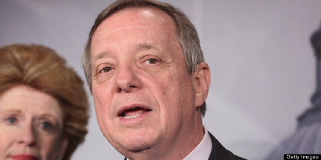 WASHINGTON, DC - MARCH 21: Senate Majority Whip Richard Durbin (D-IL) (C) speaks during a news conference with Sen. Debbie Stabenow (D-MI) (L) and Sen. Barbara Boxer (D-CA) at the U.S. Capitol March 21, 2013 in Washington, DC. The senators held the news conference to criticize the House of Representatives for passing House Budget Committee Chairman Paul Ryan's 2014 budget 221 to 207. (Photo by Chip Somodevilla/Getty Images)