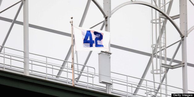 CHICAGO, IL - APRIL 18: A flag honoring Jackie Robinson flys at Wrigley Feild during a game between the Chicago Cubs and the Texas Rangers on April 18, 2013 in Chicago, Illinois. The Cubs defeated the Rangers 6-2. (Photo by Jonathan Daniel/Getty Images)