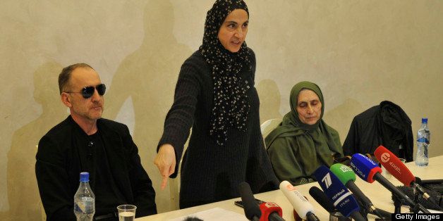 MAKHACHKALA, DAGESTAN - APRIL 25: Zubeidat Tsarnaeva (C), the mother of suspected Boston bombers Tamerlan and Dzhokhar Tsarnayev, speaks to reporters while the father Anzor Tsarnaev and aunt Patimat Suleymanova look on, during a news conference on April 25, 2013 in Makhachkala, Dagestan. Zubeidat Tsarnaeva attacked the US authorities over the death of her son Tamerlan, 26, who was killed during a shootout with police. Dzhokhar, 19, who was in hospital at the time of the press conference, has now been moved from the Beth Israel Deaconess Medical Center in Boston to Fort Devens prison. (Photo by Sergey Rassulov/Getty Images)