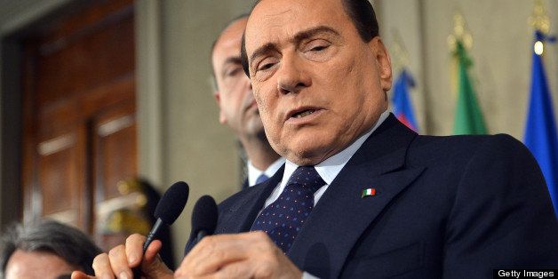 Former Italian prime minister Silvio Berlusconi gives a press conference at the Quirinale presidential palace on April 23, 2013 in Rome after talks with Italian President Giorgio Napolitano. Napolitano today held a round of consultations with political leaders following his re-election in a new bid to end a two-month deadlock on forming a government.AFP PHOTO / ALBERTO PIZZOLI (Photo credit should read ALBERTO PIZZOLI/AFP/Getty Images)