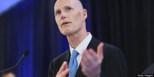MIAMI, FL - FEBRUARY 22: Florida Gov. Rick Scott speaks to the media during a visit to the Advanced Pharma to kick-off the grand opening of their new facility that hopes to create 60 new jobs by 2014 on February 21, 2013 in Miami, Florida. Florida Gov. Rick Scott reversed himself on February 20, 2013 and now is callling for an expansion of Medicaid to Florida residents under the federal Affordable Care Act. (Photo by Joe Raedle/Getty Images)