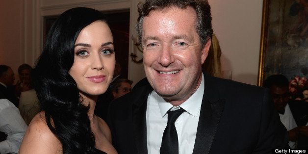 WASHINGTON, DC - APRIL 27: Katy Perry and Piers Morgan attend the Bloomberg & Vanity Fair cocktail reception following the 2013 WHCA Dinner at the residence of the French Ambassador on April 27, 2013 in Washington, DC. (Photo by Dimitrios Kambouris/VF13/WireImage)