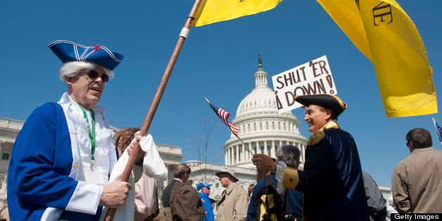 UNITED STATES Ð APRIL 6: Tea party activists Bob Mason, left and John Oltesvig, both of North Carolina, wear colonial costumes with tri-corner hats as they participate in the rally at the Capitol on Wednesday, April 6, 2012, days before a possible federal government shutdown. (Photo By Bill Clark/Roll Call)