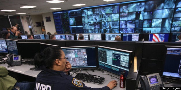 NEW YORK, NY - APRIL 23: Police and private security personel monitor security cameras at the Lower Manhattan Security Initiative on April 23, 2013 in New York City. At the counter-terrorism center, police and private security personel monitor more than 4,000 surveillance cameras and license plate readers mounted around the Financial District and surrounding parts of Lower Manhattan. Designed to identify potential threats it is modeled after London's 'Ring of Steel' system. (Photo by John Moore/Getty Images)