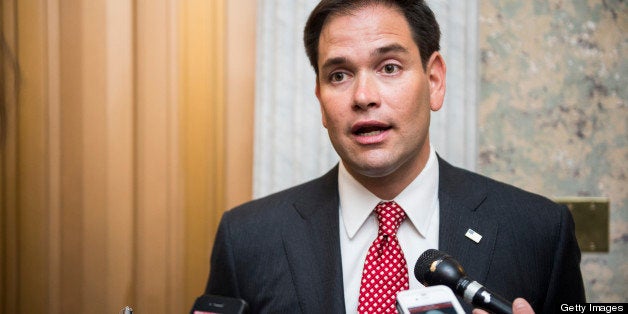 UNITED STATES - MAY 7: Sen. Marco Rubio, R-Fla., speaks with reporters outside of the Senate floor in the Capitol on Tuesday,