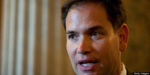 UNITED STATES - May 7 : Sen. Marco Rubio, R-Fl., talks with reporters about immigration reform on his way to the luncheons in the U.S. Capitol on May 7, 2013. (Photo By Douglas Graham/CQ Roll Call)