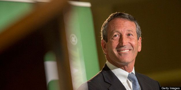 CHARLESTON, SC - APRIL 29: Rupublican candidate for the open Congressional seat of South Carolina, Former South Carolina Governor Mark Sanford, smiles after avoiding a question about his extra marital affair during a debate against U.S. House of Representatives Democratic candidate for the state of South Carolina Elizabeth Colbert Busch at the Citadel on April 29, 2013 in Charleston, South Carolina. Mark Sanford is challenging Democrat Colbert Busch in a special election for the House seat vacated by current U.S. Sen. Tim Scott. (Photo by Richard Ellis/Getty Images)