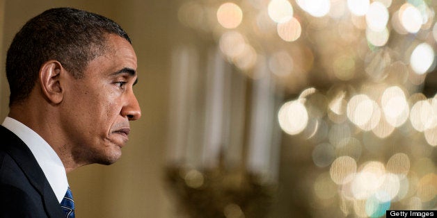 US President Barack Obama listens to a question during a press conference in the East Room of the White House May 7, 2013 in Washington, DC. Obama and Park held the press conference after a meeting in the Oval Office. AFP PHOTO/Brendan SMIALOWSKI (Photo credit should read BRENDAN SMIALOWSKI/AFP/Getty Images)