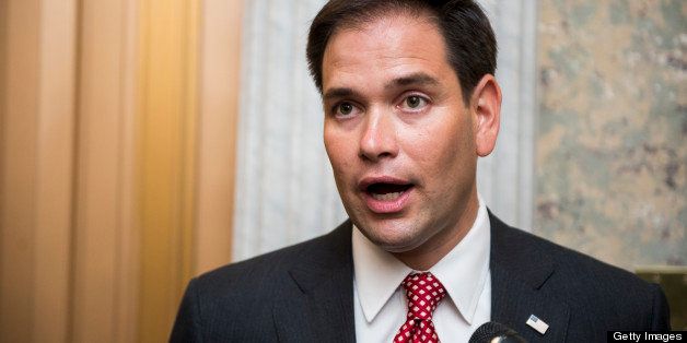 UNITED STATES - MAY 7: Sen. Marco Rubio, R-Fla., speaks with reporters outside of the Senate floor in the Capitol on Tuesday, May 7, 2013. (Photo By Bill Clark/CQ Roll Call)