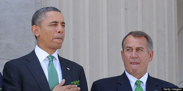 US President Barack Obama is accompanied by House Speaker John Boehner as he leaves the US Capitol after attending a St. Patrick?s Day lunch along with Irish Prime Minister Enda Kenny in Washington, DC, on March 19, 2013. AFP PHOTO/Jewel Samad (Photo credit should read JEWEL SAMAD/AFP/Getty Images)