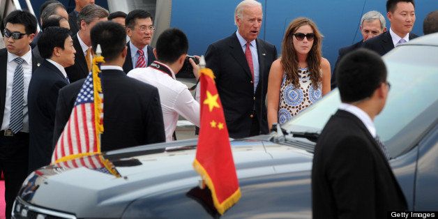 CHENGDU, CHINA - AUGUST 20: (CHINA OUT) U.S. Vice President Joe Biden and his granddaughter Naomi Biden arrive in Chengdud during his visit to China on August 20, 2011 in Chengdu, Sichuan Province of China. The Vice President is on a four-day visit to China during which he is focusing on discussions over concerns about the global economy and the world stock markets. (Photo by ChinaFotoPress/Getty Images)