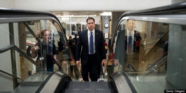 UNITED STATES - MARCH 19: Sen. Marco Rubio, R-Fla., arrives in the Capitol via the Senate subway for the Senate policy lunch on Tuesday, March 19, 2013. (Photo By Bill Clark/CQ Roll Call)