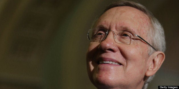 WASHINGTON, DC - MAY 09: Senate Majority Leader Harry Reid (D-NV) answers reporters questions before a Senate Democratic Policy Committee luncheon meeting at the U.S. Captiol May 9, 2013 in Washington, DC. Despite indications that the federal government will not reach its debit limit until the fall, Reid said the White House will, within weeks, announce the limit will have been reached. (Photo by Chip Somodevilla/Getty Images)