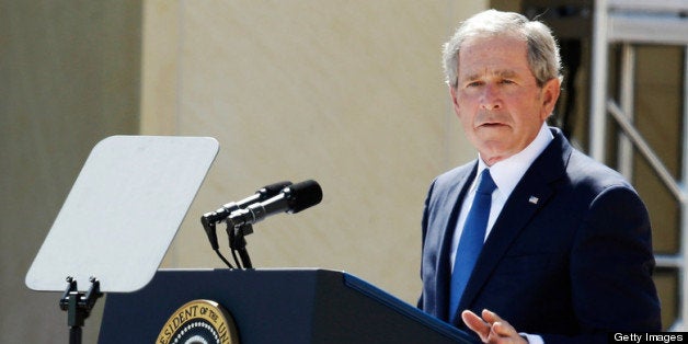 DALLAS, TX - APRIL 25: U.S. President Barack Obama (L) listens as former President George W. Bush speaks during the opening ceremony of the George W. Bush Presidential Center April 25, 2013 in Dallas, Texas. The Bush library, which is located on the campus of Southern Methodist University, with more than 70 million pages of paper records, 43,000 artifacts, 200 million emails and four million digital photographs, will be opened to the public on May 1, 2013. The library is the 13th presidential library in the National Archives and Records Administration system. (Photo by Tony Gutierrez-Pool/Getty Images)