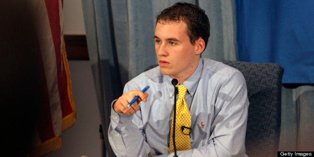 HILLSDALE, MI - NOVEMBER 21: Eighteen-year-old Michael Sessions chairs his first city council meeting moments after being