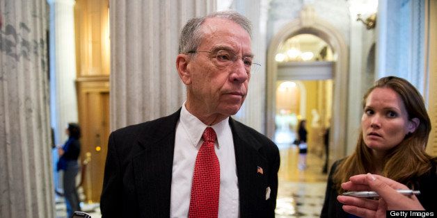 UNITED STATES - APRIL 23: Sen. Chuck Grassley, R-Iowa, talks with a reporter before the senate luncheons in the Capitol. (Photo By Tom Williams/CQ Roll Call)