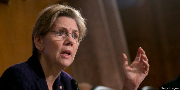 Senator Elizabeth Warren, a Democrat from Massachusetts, questions witnesses during a Senate Banking Committee hearing in Washington, D.C., U.S., on Thursday, March 7, 2013. The U.S. regulator of national banks is weighing changes to make it easier to eject from the industry bankers who knowingly skirt money-laundering rules. Photographer: Andrew Harrer/Bloomberg via Getty Images 