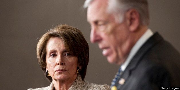 UNITED STATES ? DECEMBER 16: House Minority Leader Nancy Pelosi, D-Calif., listens as House Minority Whip Steny Hoyer, D-Md., speaks during a news conference Friday, Dec. 16, 2011, as Congress tries to reach a deal on unemployment insurance and payroll tax cuts. (Photo by Bill Clark/CQ Roll Call)