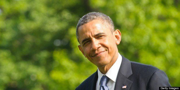 US President Barack Obama smiles as he returns to the White House in Washington on May 19, 2013 from Atlanta. AFP PHOTO/Nicholas KAMM (Photo credit should read NICHOLAS KAMM/AFP/Getty Images)