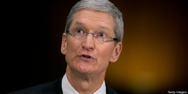 Tim Cook, chief executive officer of Apple Inc., speaks during a Senate Permanent Subcommittee on Investigations hearing in Washington, D.C., U.S., on Tuesday, May 21, 2013. Apple Inc. used 'loopholes' to avoid paying $9 billion in U.S. taxes in 2012, U.S. Senator Carl Levin said. Photographer: Andrew Harrer/Bloomberg via Getty Images 