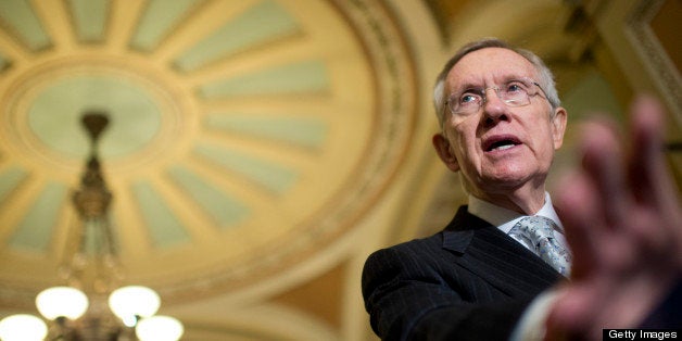 UNITED STATES - MAY 21: Senate Majority Leader Harry Reid, D-Nev., conducts a news conference in the Capitol's Ohio Clock Corridor after the senate luncheons where he addressed issues including the Oklahoma tornado. (Photo By Tom Williams/CQ Roll Call)