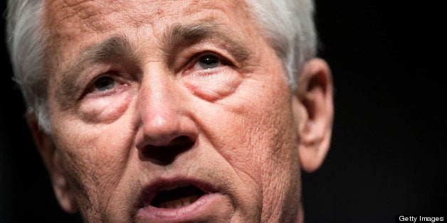 US Secretary of Defense Chuck Hagel speaks about furloughs during a town hall style meeting at the Department of Defense's MA