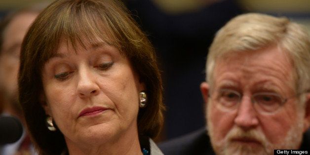WASHINGTON, DC - MAY 22: Lois Lerner, former Director of Exempt Organizations, left, listens to her attorney, right, as Internal Revenue Service officials face the House Oversight Committee on May, 22, 2013 in Washington, DC. (Photo by Bill O'Leary/The Washington Post via Getty Images)