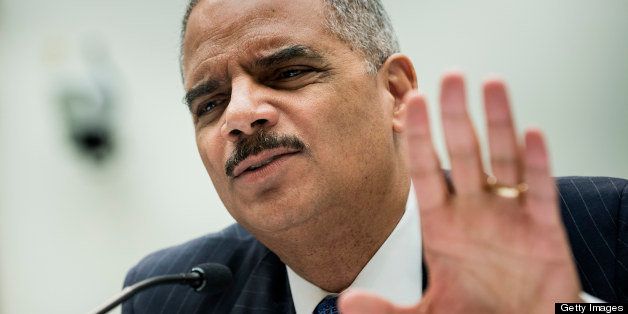 US Attorney General Eric H. Holder testifies during a hearing of the House Judiciary Committee on Capitol Hill May 15, 2013 in Washington, DC. Holder and other members of the Obama administration are being criticized over reports of the Internal Revenue Services'(IRS) scrutiny of conservative organization's tax exemption requests and the subpoena of two months worth of Associated Press journalists' phone records. AFP PHOTO/Brendan SMIALOWSKI (Photo credit should read BRENDAN SMIALOWSKI/AFP/Getty Images)