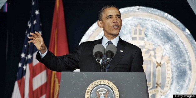 US President Barack Obama delivers the commencement address during the US Naval Academy the graduation ceremony at the Navy-M