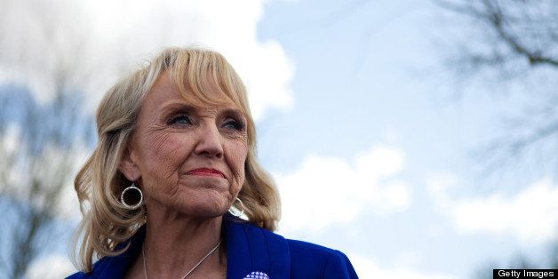 GLENDALE, AZ - FEBRUARY 28: Arizona Gov. Jan Brewer talks to the news media after voting in the Republican presidential primary February 28, 2012 in Glendale, Arizona. Arizona is a winner take all state, with all the delegates from the state going to the winner of the primary. Early voting began in the state February 2, with over 300, 000 votes already cast as of February 27. (Photo by Jonathan Gibby/Getty Images)