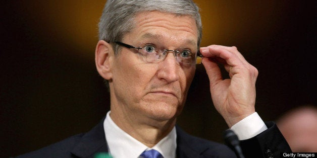 WASHINGTON, DC - MAY 21: Apple CEO Timothy Cook testifies before the Senate Homeland Security and Governmental Affairs Committee's Investigations Subcommittee about the company's offshore profit shifting and tax avoidance in the Dirksen Senate Office Building on Capitol Hill May 21, 2013 in Washington, DC. A Congressional report released yesterday said that Apple, America's most profitable technology company, used a complex system of international subsidiaries and tax avoidance efforts to shift at least $74 billion out of the reach of the Internal Revenue Service between 2009 and 2012. (Photo by Chip Somodevilla/Getty Images)