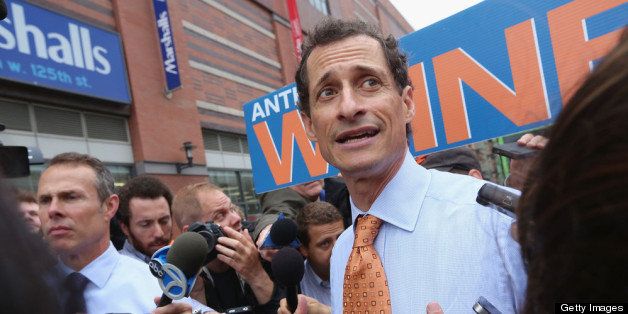 NEW YORK, NY - MAY 23: Anthony Weiner is surrounded by media while courting voters outside a Harlem subway station a day after announcing he will enter the New York mayoral race on May 23, 2013 in New York City. Weiner is joining the Democratic race to succeed three-term Mayor Michael Bloomberg after he was forced to resign from Congress in 2011 following the revelation of sexually explicit online behavior. (Photo by Mario Tama/Getty Images)