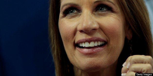 Representative Michele Bachmann, a Republican from Minnesota, smiles at the Republican National Convention (RNC) in Tampa, Florida, U.S., on Tuesday, Aug. 28, 2012. Delegates are gathered in Tampa at the 40th Republican National Convention to select former Massachusetts governor Mitt Romney as their nominee for the next president of the United States. Photographer: Daniel Acker/Bloomberg via Getty Images 