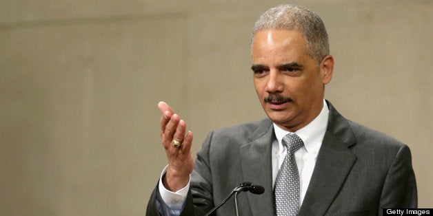 WASHINGTON, DC - MAY 29: U.S. Attorney General Eric Holder delivers remarks during the Justice Department Inspector General's annual awards ceremony in the Great Hall at the Robert F. Kennedy Department of Justice building May 29, 2013 in Washington, DC. After it was revealed that the Justice Department was investigating journalists from the Associated Press and FOX News, the department began contacting major print and broadcast news organization bureau chiefs to set up a meeting this week with Holder to discuss changes to guidelines for subpoenas to news organizations. (Photo by Chip Somodevilla/Getty Images)