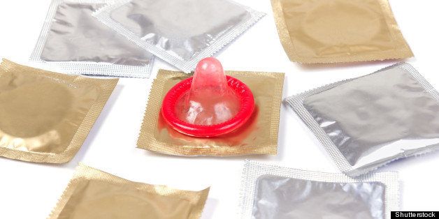 red condom with packs on a...