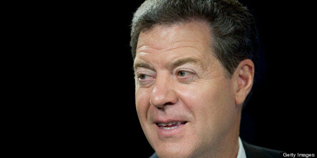 Sam Brownback, governor of Kansas, speaks during a Bloomberg Television interview inside the Bloomberg Link during the Republ