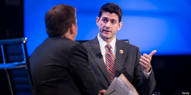 Chuck Todd, of NBC, listens as Representative Paul Ryan (R-WI), Chairman of the House Budget Committee, speaks during the 2013 Fiscal Summit at Mellon Auditorium May 7, 2013 in Washington, DC. Public and private leaders attended the summit to discus solving the problems caused by the a financial crisis in the US economy and the state of the US federal budget. AFP PHOTO/Brendan SMIALOWSKI (Photo credit should read BRENDAN SMIALOWSKI/AFP/Getty Images)