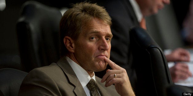UNITED STATES - April 19 : Sen. Jeff Flake, R-AZ., during the Senate Judiciary full Committee hearing on comprehensive immigr