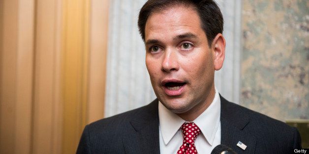 UNITED STATES - MAY 7: Sen. Marco Rubio, R-Fla., speaks with reporters outside of the Senate floor in the Capitol on Tuesday, May 7, 2013. (Photo By Bill Clark/CQ Roll Call)