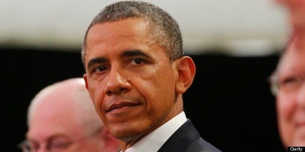 ENNISKILLEN, UNITED KINGDOM - JUNE 17: U.S. President Barack Obama glances at Britain's Prime Minister David Cameron (R) dur