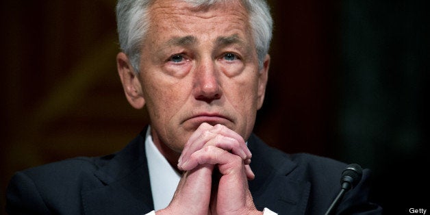 US Defense Secretary Chuck Hagel testifies at a Senate Budget Committee hearing on 'The President's FY2014 Defense Budget Request,' on June 12, 2013 on Capitol Hill In Washington, DC. Topics of discussion included the impact of sequestration and sexual assaults in the military. AFP PHOTO / Karen BLEIER (Photo credit should read KAREN BLEIER/AFP/Getty Images)