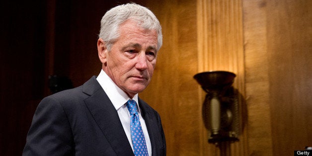 US Defense Secretary Chuck Hagel arrives to testify at a Senate Budget Committee hearing on 'The President's FY2014 Defense B
