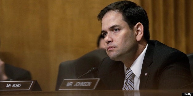 WASHINGTON, DC - APRIL 11: U.S. Sen. Marco Rubio (R-FL) listens as U.S. Ambassador to the Syrian Arab Republic Robert Ford testifies before the Senate Foreign Relations Committee on Capitol Hill April 11, 2013 in Washington, DC. Ford testified on current U.S. policy toward Syria. (Photo by Win McNamee/Getty Images)