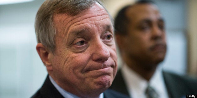 UNITED STATES - JUNE 11: Sen. Richard Durbin, D-Ill., speaks with reporters as he makes his way from the Senate subway to the Capitol for the weekly policy lunch on Tuesday, June 11, 2013. (Photo By Bill Clark/CQ Roll Call)