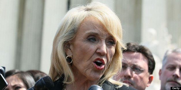 WASHINGTON, DC - APRIL 25: Arizona Gov. Jan Brewer speaks to the media after arguments at the U.S. Supreme Court, on April 25, 2012 in Washington, DC. This morning the high court will heard arguments on Arizona v. United States and will be tasked with deciding the conflicting roles of national and state governments in controlling the lives of noncitizens living illegally in the U.S.while deciding the constitutionality of Arizona's immigration law SB 1070. (Photo by Mark Wilson/Getty Images)