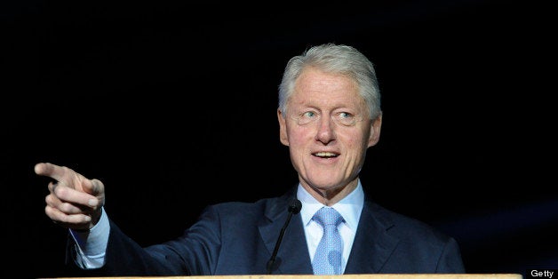 Former US President Bill Clinton speaks on June 17, 2013 at the Peres Academic Center (EAC) in Rehovot. Clinton came to Israel to participate in celebrations marking Israeli President Shimon Peres' 90th birthday.and arrive AFP PHOTO / DAVID BUIMOVITCH (Photo credit should read DAVID BUIMOVITCH/AFP/Getty Images)