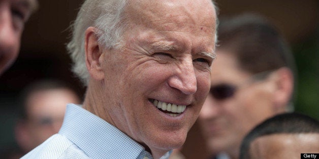 SOUTH BOSTON, MA - JUNE 22: Vice President Joe Biden talks with members of the public outside Sullivan's Castle Island while campaigning with Rep. Ed Markey in South Boston on Saturday, June 22, 2013. Both Democratic candidate Ed Markey and Republican candidate Gabriel Gomez are keeping busy schedules in the final weekend before the special election for the U.S. Senate, with both campaigns trying to rally supporters and mobilize for a get-out-the-vote effort. (Photo by Colm O'Molloy for The Boston Globe via Getty Images)